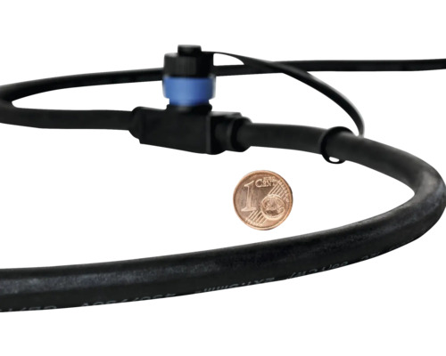 Druppelslang met regelventiel en vergelijkingsmunt voor maatindicatie