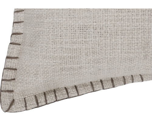 Detailweergave van een geweven tapijt met randversteviging