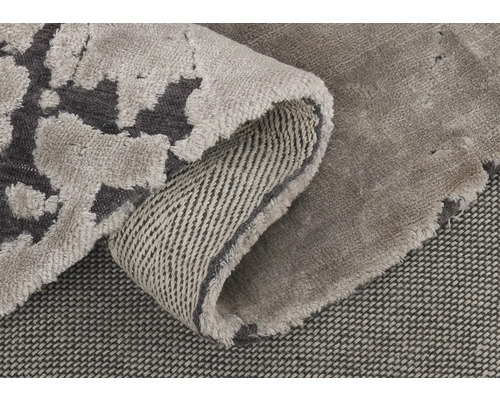 Tapijt met patroon, opgerold