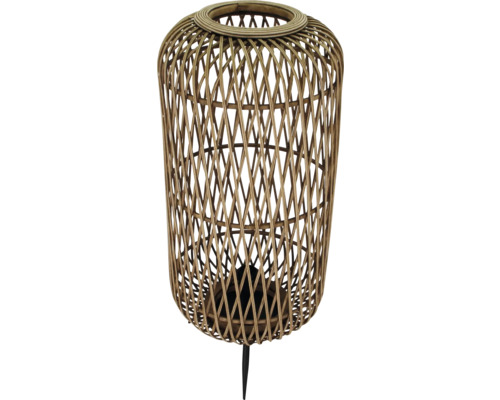 Decoratieve lantaarn van rotan met een zwarte metalen voet.