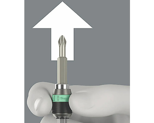 Een kruiskopschroevendraaierbit met een witte markering, vastgehouden door een hand.