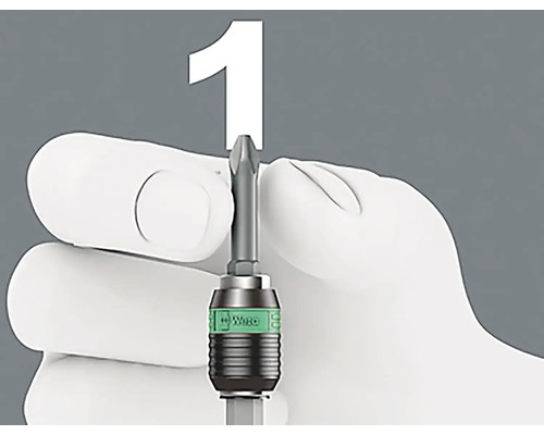 Een schroevendraaierbit wordt door een hand vastgehouden.