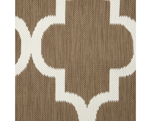 Detailweergave van een tapijt met geometrisch patroon