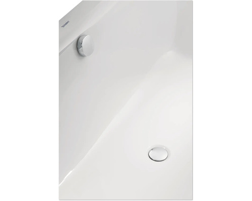 Detailopname van een witte Duravit wastafel met verchroomde afvoerklep en overloop