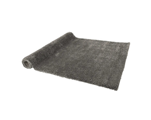 Opgerolde grijze vloerkleed