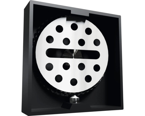 Ventilatie-apparaat met ronde, geperforeerde afdekking in een zwarte behuizing
