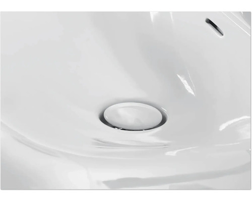 Detailweergave van een wastafel met overloop