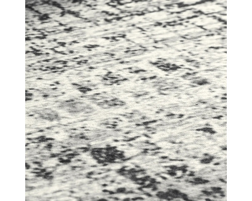 Detailopname van een vloerkleed met abstract patroon