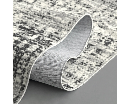 Grijs tapijt met abstract patroon