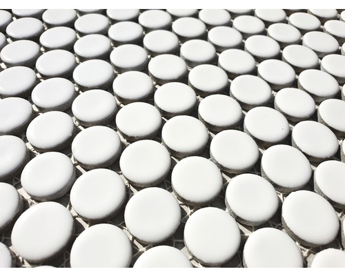 Detailopname van witte ronde mozaïektegels