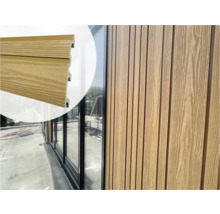 Houten gevelbekleding met veer en groef