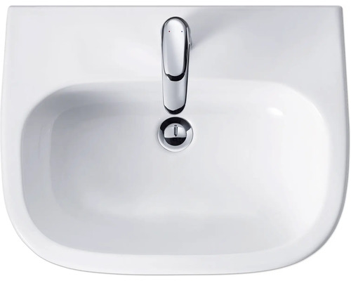 Bovenaanzicht keramische wastafel met kraan