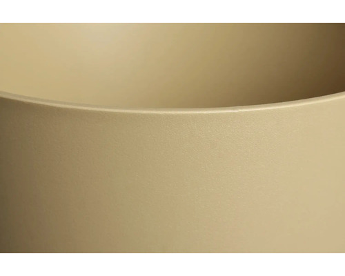 Close-up van een beige plantenbak