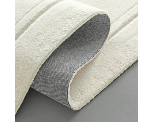 Detailopname van een wit tapijt met structuur