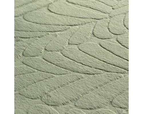 Close-up van een vloerkleed met bladmotief