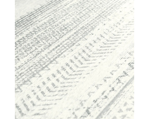 Close-up van een vloerkleed met geometrisch patroon