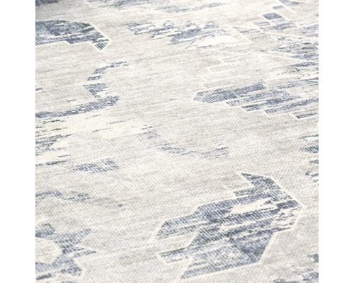 Detailopname van een tapijt met motief