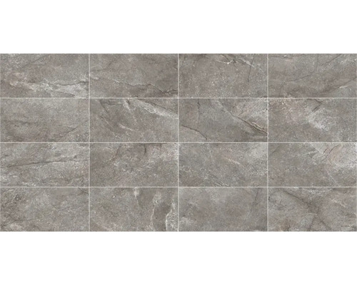 Grijze tegels met steenlook in verband gelegd