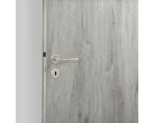 Binnendeur met houtpatroon en deurbeslag