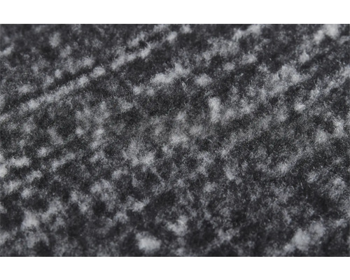 Close-up van een grijs tapijt met gemêleerd oppervlak.