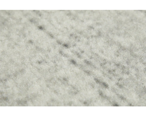 Close-up van een lichtgekleurd tapijt