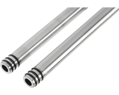 Twee metalen buizen met groeven