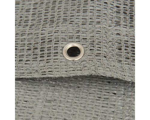 Gedetailleerde foto van een grijs schaduwdoek met oogje.