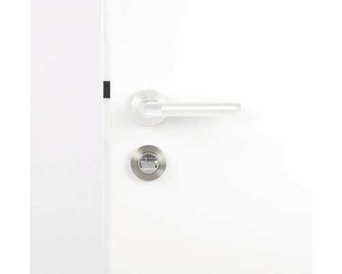 Deurbeslag met draaiknop op een witte deur