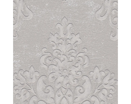 Close-up van een gestructureerd behang met bloemmotief