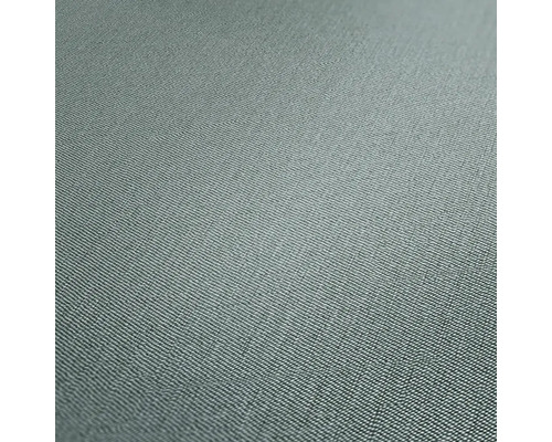 Close-up van een textielbehang met fijne structuur