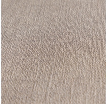 Close-up van een beige structuurbehang