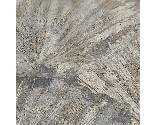 Close-up van een sierpleisteroppervlak met een stralend patroon