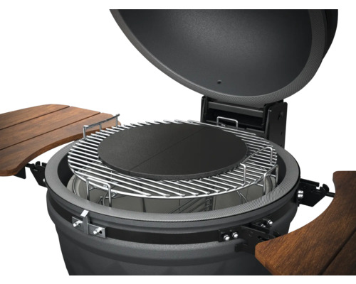 Barbecue met grillrooster en stenen plaat