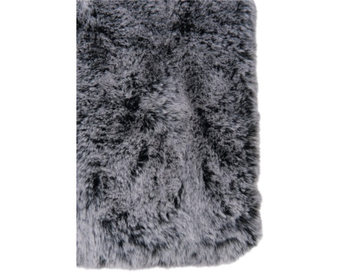 Detailopname van een tapijt met vachtstructuur