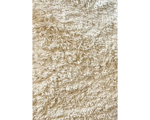 Close-up van een hoogpolig tapijt