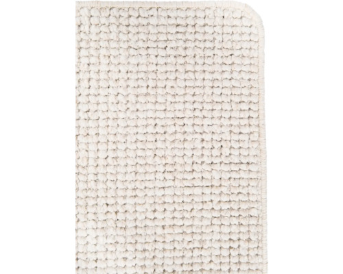 Witte badmat met noppenstructuur