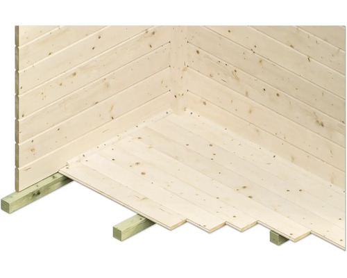 Detail van een tuinhuis in aanbouw met houten wanden en houten vloer