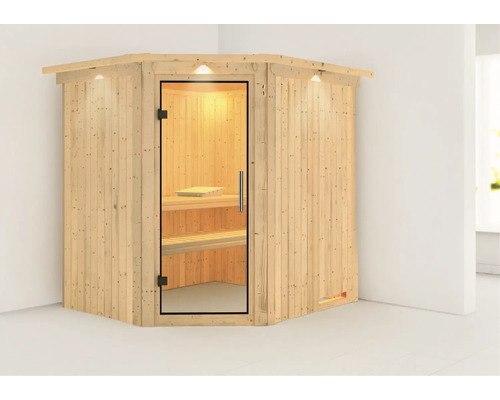 Hoeksauna met glazen deur en binnenverlichting.