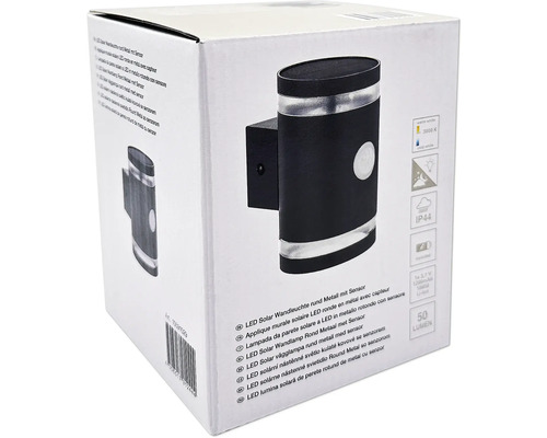 Verpakking van een ronde solar LED wandlamp van metaal met sensor