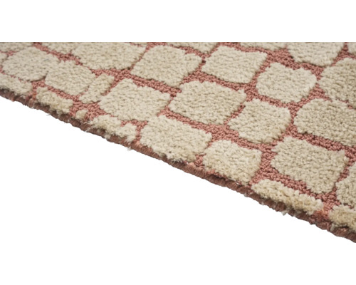 Detailweergave van een tapijt met vierkant patroon