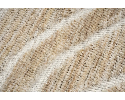 Close-up van een beige tapijt met een gestreept patroon