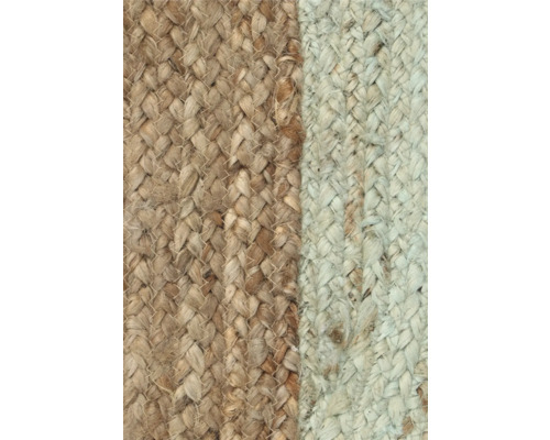Close-up van een gevlochten tapijt van natuurlijke vezels