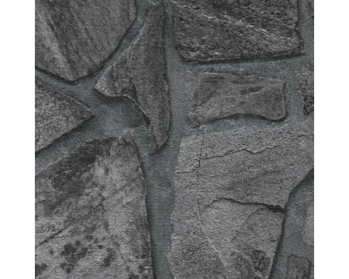 Close-up van een grijze stenen muurtextuur.