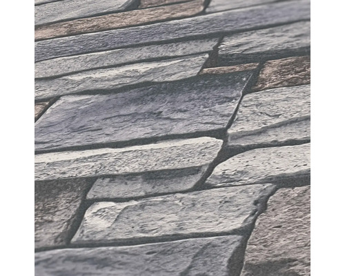 Close-up van een behang met steenmotief.