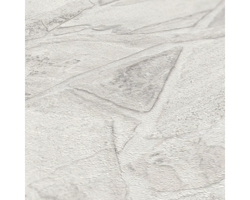 Close-up van een wit behang met steenmotief