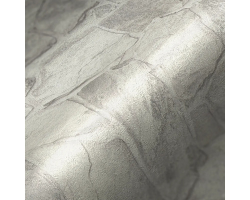 Grijs behang met steeneffect