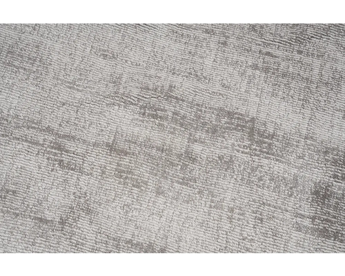 Close-up van een tapijt met onregelmatig patroon