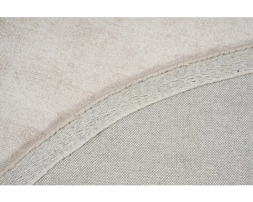 Detailweergave van een tapijt met textielrug