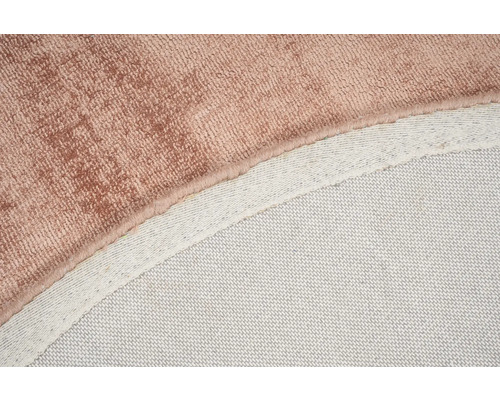 Detailweergave van een tapijt met een textielen rug