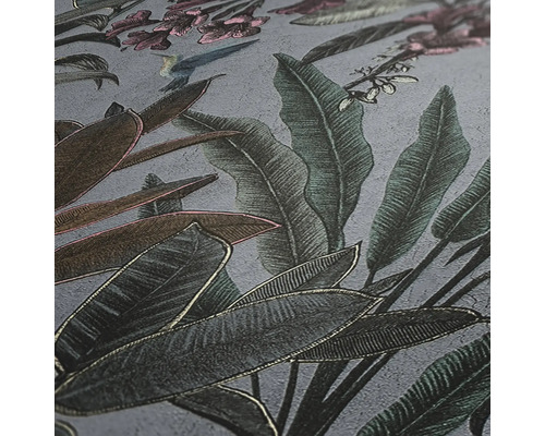 Close-up van behang met bladeren- en vogelmotief